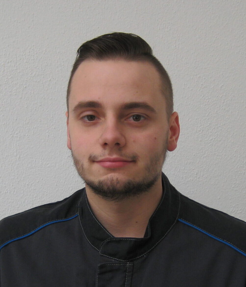 Portraitfoto von Mateusz Malkiewicz